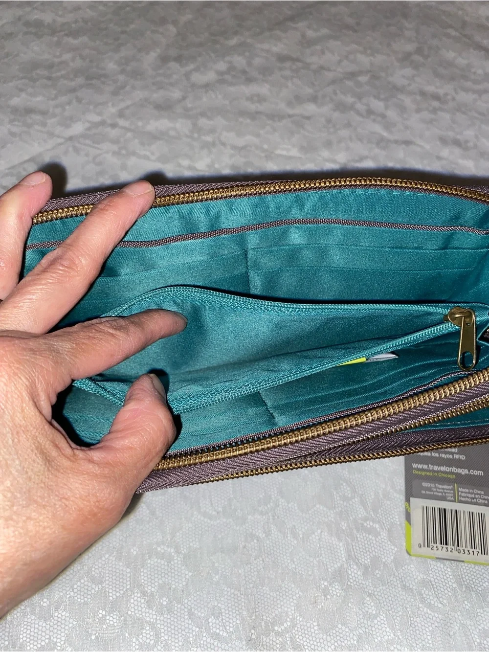 Travelon quilted Wristlet Wallet -RFID blocking to protect cards and ID.